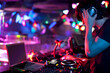 © Blue Jean Images - Chinese DJ doing record scratching in nightclub