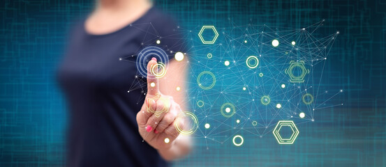 Wall Mural - Woman touching a digital network concept