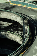 Abandoned Parking Lot Reveals A Hauntingly Beautiful Circular Structure, A Forgotten Echo In An Empty Urban Landscape