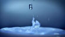 The process of boiling water, a stream of water shooting out of a humidifier or diffuser taken in close-up