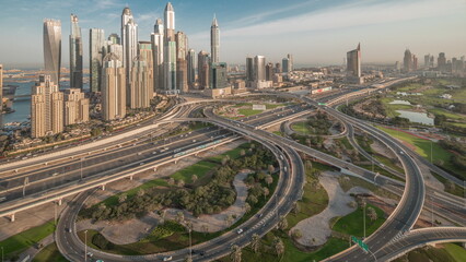 Wall Mural - Dubai Marina highway intersection spaghetti junction night to day timelapse
