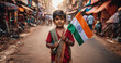 Indian boy holding India flag in a street