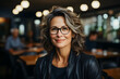 © mitarart - Confident business 50-year-old woman.