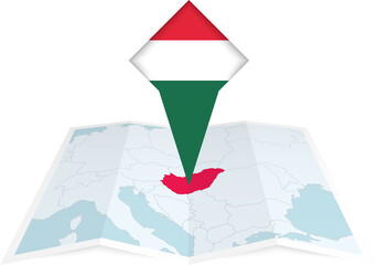 Wall Mural - Hungary pin flag and map on a folded map