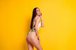 Photo of sweet dreamy girl dressed bodysuit enjoying summer journey empty space isolated yellow color background