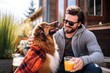 man and his dog savoring a smoothie outdoor