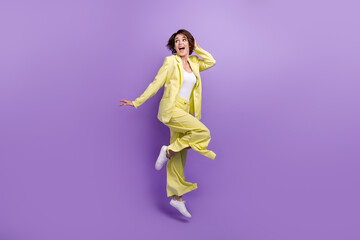 Sticker - Full length photo of optimistic woman dance jump overjoyed lime style garment funny person good vibe isolated on purple color background