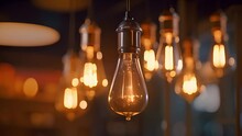 Retro Decorative Lightbulbs Hanging. Vintage Design 4k Close-up Of A Tungsten Light Bulb Sparkling With Bokeh Lights. Energy, Electricity, Innovation Concept. Modern Stylish Decorative Lamps Vintage B