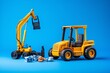 © Muhammad - Toy forklift, asphalt paver and excavator on blue background