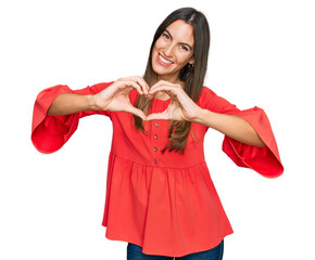 Canvas Print - Young beautiful woman wearing casual clothes smiling in love showing heart symbol and shape with hands. romantic concept.