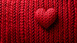 red heart emoji, knitted ball of red wool, woven wool pattern, red wool sweater. concept of love, valentine's day, affection, wedding day. AI generate
