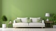 Home interior mock-up with beige sofa with green cushions, table and decor in living room on blank green painted wall backgrounds.