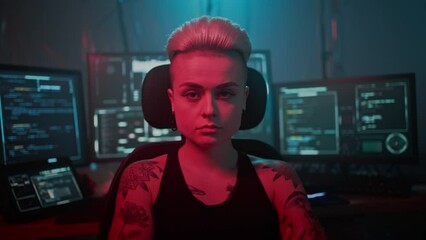 Wall Mural - woman programmer sits against active software on screens