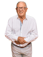 Canvas Print - Senior caucasian man wearing business shirt and glasses with hand on stomach because indigestion, painful illness feeling unwell. ache concept.