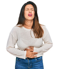 Sticker - Beautiful hispanic woman wearing casual sweater with hand on stomach because nausea, painful disease feeling unwell. ache concept.