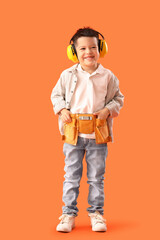 Poster - Cute little worker on orange background