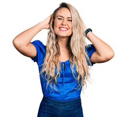 Sticker - Young blonde woman wearing casual clothes relaxing and stretching, arms and hands behind head and neck smiling happy