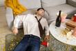 Drunk young man sleeping after New Year party at home