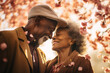 © MNStudio - Happy senior black couple walking a blossoming sakura park on spring evening. Retired husband and wife having fun outdoors. Retirement hobby and leisure activity for elderly people.