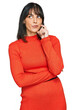 © Krakenimages.com - Young hispanic woman wearing casual clothes serious face thinking about question with hand on chin, thoughtful about confusing idea