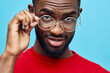 © SHOTPRIME STUDIO - stylish man american african style fashionable portrait fashion black glasses model blue