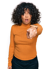 Poster - Young hispanic woman wearing casual clothes pointing displeased and frustrated to the camera, angry and furious with you