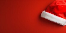 Santa Claus Red Hat Close Up On Red Background. Merry Christmas Concept.