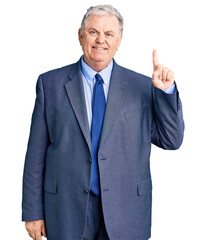 Poster - Senior grey-haired man wearing business jacket showing and pointing up with finger number one while smiling confident and happy.