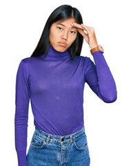 Poster - Beautiful young asian woman wearing casual clothes worried and stressed about a problem with hand on forehead, nervous and anxious for crisis