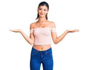 Sticker - Young beautiful woman wearing casual clothes smiling showing both hands open palms, presenting and advertising comparison and balance