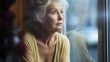 © Imran - Worried hot elderly woman looking in window. Ai generative