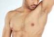 Body, closeup and man smelling armpit in studio for wellness, hygiene or control on white background. Underarm, care or guy model with sweat, scent or odor check after shower, cleaning or grooming