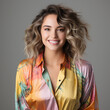 © riccardozamboni - Portrait of beautiful female model with moisturized, clean natural skin, white smile, laughing and smiling, applying face care lotion, cream
