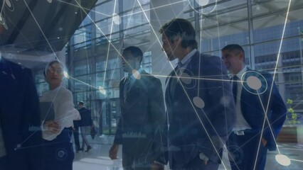 Poster - Animation of network of connections over diverse male and female colleagues walking in office