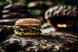 large double hamburger on dark stone background 