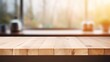 © Sim - Wooden table with kitchen blur background