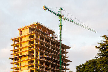 Wall Mural - travel to georgia - construction of high-rise building in batumi city in autumn twilight