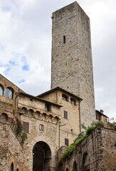 Wall Mural -  Via San Giovanni in the medieval town of San Gimingnano. Tuscany, Italy