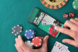 © Davizro Photography - Online game app on tablet on game table with objects
