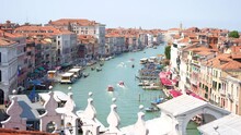 Grand Canal Of Venice With Boats, Gondolas And Picturesque Houses Seen From Fondaco Dei Tedeschi Rooftop