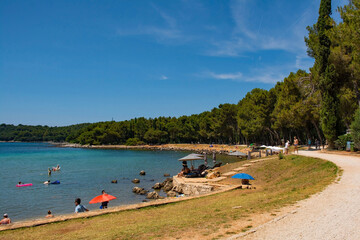 Wall Mural - Cuvi Beach just south of Rovinj old town in Istria, Croatia