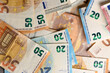 euro bills scattered on the table as a background 5