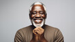 Studio portrait of black handsome aged man smiling to the camera. AI generative