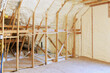 © ungvar - Wall in new home under construction is made up of spray foam thermal hydro insulation