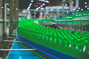 Wall Mural - Beverage factory interior. Conveyor flowing with bottles for water