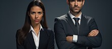 Middle age couple of hispanic woman and man wearing business office uniform skeptic and nervous disapproving expression on face with crossed arms negative person. Website header. Creative Banner