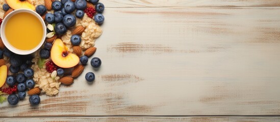 Wall Mural - Healthy breakfast with oatmeal porridge fruits and nuts Blueberry mango pumpkin seeds nuts coffee cup Top view Female hands. Website header. Creative Banner. Copyspace image