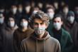 Not like everyone, a man is not wearing a protective mask among other people wearing masks. concept of social consciousness and proper behavior