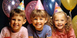 © Gabriela - Three children with balloons, party hats and confetti, celebrating