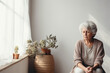 Elderly woman who is depressed and feels lonely at home suffers from loneliness.